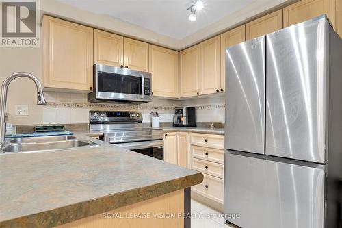 114 - 760 Lawrence Avenue W, Toronto, ON - Indoor Photo Showing Kitchen With Stainless Steel Kitchen With Double Sink