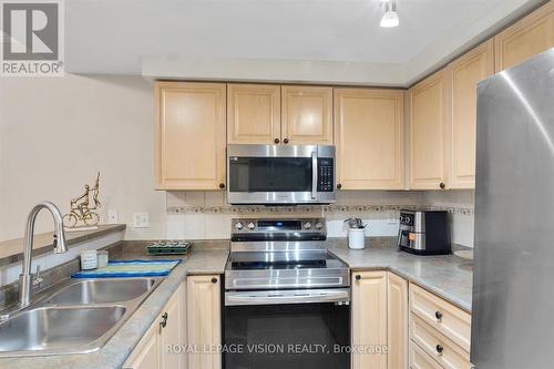 114 - 760 Lawrence Avenue W, Toronto, ON - Indoor Photo Showing Kitchen With Double Sink