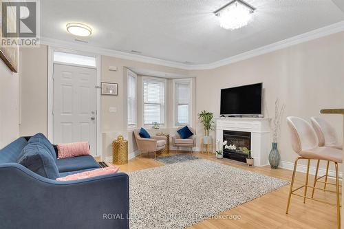 114 - 760 Lawrence Avenue W, Toronto, ON - Indoor Photo Showing Living Room With Fireplace