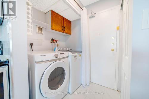 Ph104 - 90 Ling Road, Toronto, ON - Indoor Photo Showing Laundry Room