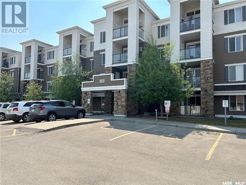 202E 1300 Stockton Street N, Regina, SK - Outdoor With Balcony With Facade