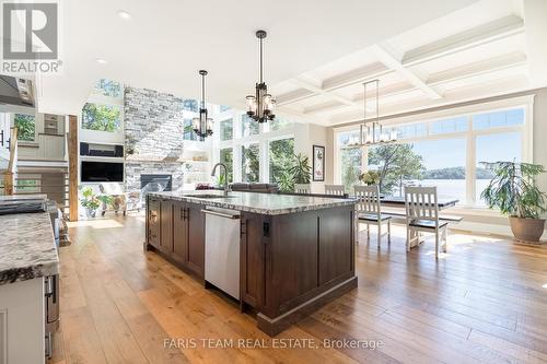 8698 Highway 12, Orillia, ON - Indoor Photo Showing Kitchen With Fireplace With Upgraded Kitchen