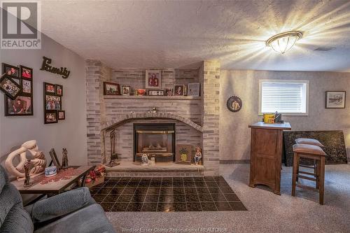 3220 Candlewood Crescent, Windsor, ON - Indoor Photo Showing Living Room With Fireplace