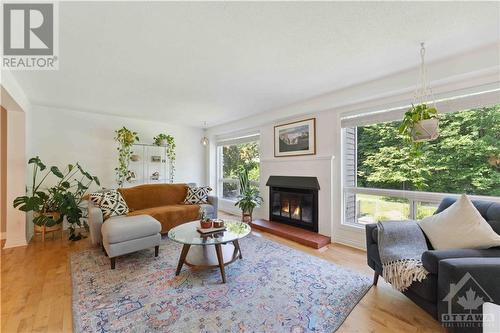 6927 Du Bois Avenue, Ottawa, ON - Indoor Photo Showing Living Room With Fireplace