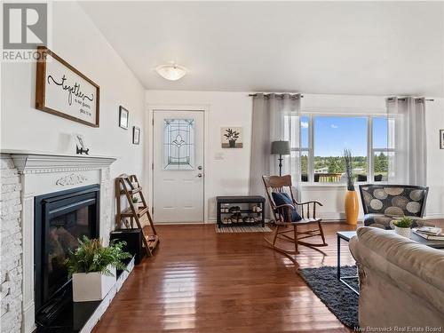 25 Alrose Lane, Bouctouche, NB - Indoor Photo Showing Living Room With Fireplace