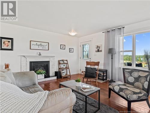 25 Alrose Lane, Bouctouche, NB - Indoor Photo Showing Living Room With Fireplace