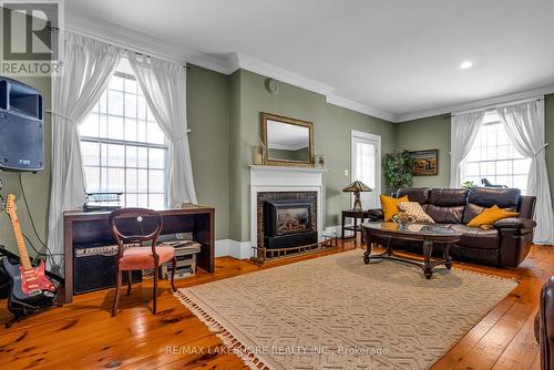 4903 County 45 Road, Hamilton Township (Baltimore), ON - Indoor Photo Showing Living Room With Fireplace