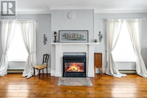 4903 County 45 Road, Hamilton Township, ON - Indoor Photo Showing Living Room With Fireplace