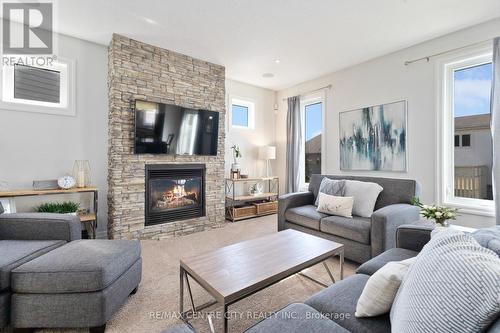 6709 Navin Crescent, London, ON - Indoor Photo Showing Living Room With Fireplace