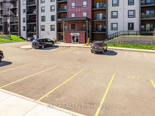 506 - 4 Spice Way, Barrie, ON - Outdoor With Balcony With Facade