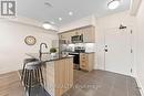 506 - 4 Spice Way, Barrie, ON  - Indoor Photo Showing Kitchen With Stainless Steel Kitchen 