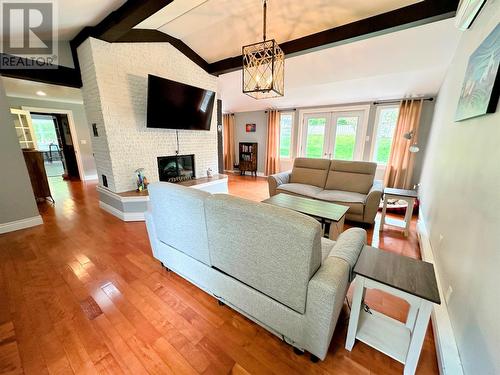 68-70 Memorial Drive, Clarenville, NL - Indoor Photo Showing Living Room With Fireplace