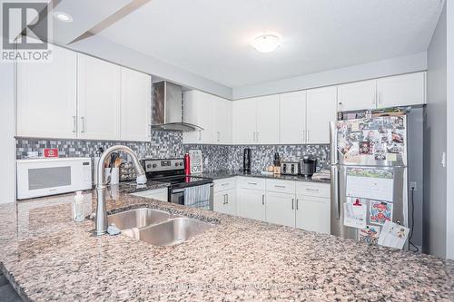 124 Summit Ridge Drive, Guelph (Grange Hill East), ON - Indoor Photo Showing Kitchen With Double Sink