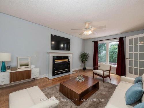 87 Arthur Ave, Barrie, ON - Indoor Photo Showing Living Room With Fireplace