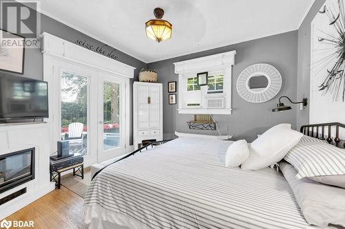 125 Dufferin Avenue, Belleville, ON - Indoor Photo Showing Bedroom With Fireplace