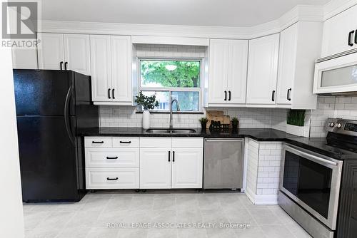 70 Bunnell Crescent, Toronto, ON - Indoor Photo Showing Kitchen With Double Sink