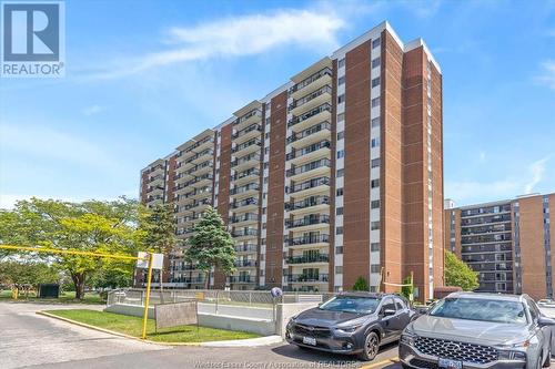 8591 Riverside Unit# 702, Windsor, ON - Outdoor With Balcony With Facade