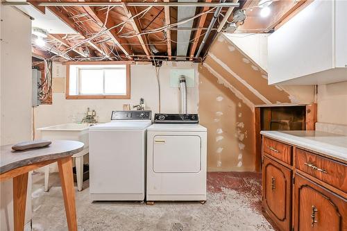 Updated window for natural light - 72 East 13Th Street, Hamilton, ON - Indoor Photo Showing Laundry Room