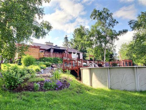 Back facade - 109 Rue Alix, Val-D'Or, QC - Outdoor With Above Ground Pool