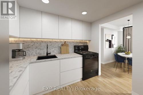 706 - 3590 Kaneff Crescent, Mississauga, ON - Indoor Photo Showing Kitchen