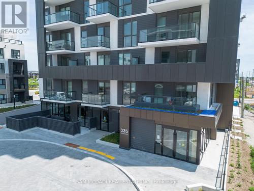 405 - 335 Wheat Boom Drive, Oakville, ON - Outdoor With Balcony With Facade