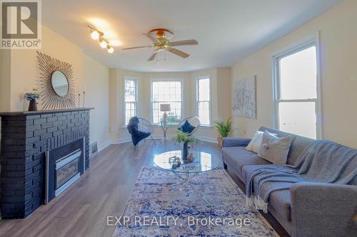 5782 Byng Avenue, Niagara Falls, ON - Indoor Photo Showing Living Room With Fireplace