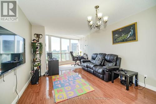 611 - 2550 Lawrence Avenue E, Toronto, ON - Indoor Photo Showing Living Room