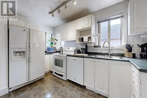 92 Eastville Avenue, Toronto, ON - Indoor Photo Showing Kitchen With Double Sink