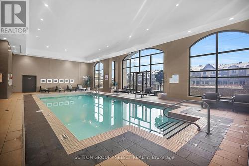 1303 - 240 Villagewalk Boulevard, London, ON - Indoor Photo Showing Other Room With In Ground Pool
