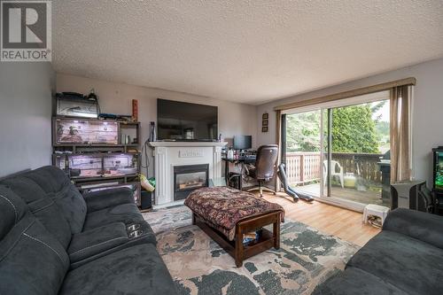 229 Dupre Avenue, Prince George, BC - Indoor Photo Showing Living Room With Fireplace