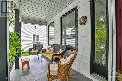 Enjoy your morning or evening beverages from the privacy of your front verandah - 19 Townsend Drive, Ottawa, ON - Outdoor With Deck Patio Veranda With Exterior