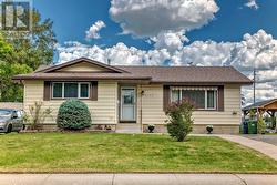 12132 CANFIELD Road SW  Calgary, AB T2W 1V2