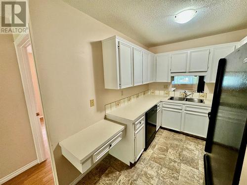 3155 Gordon Drive Unit# 106, Kelowna, BC - Indoor Photo Showing Kitchen With Double Sink