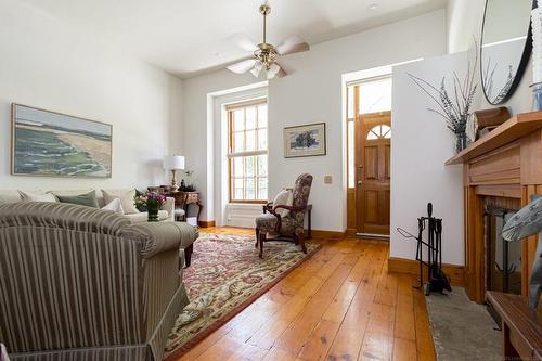 214 Bay Street S, Hamilton, ON - Indoor Photo Showing Living Room With Fireplace