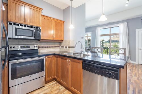 401-3533 Carrington Road, West Kelowna, BC - Indoor Photo Showing Kitchen With Stainless Steel Kitchen With Double Sink