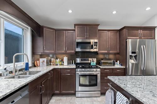 1250 Tanemura Crescent, Kelowna, BC - Indoor Photo Showing Kitchen With Double Sink With Upgraded Kitchen