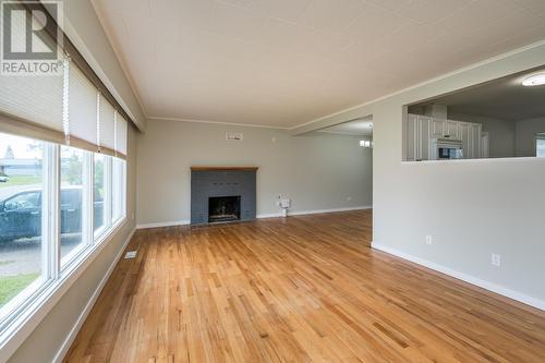 205 Irwin Street, Prince George, BC - Indoor Photo Showing Living Room With Fireplace