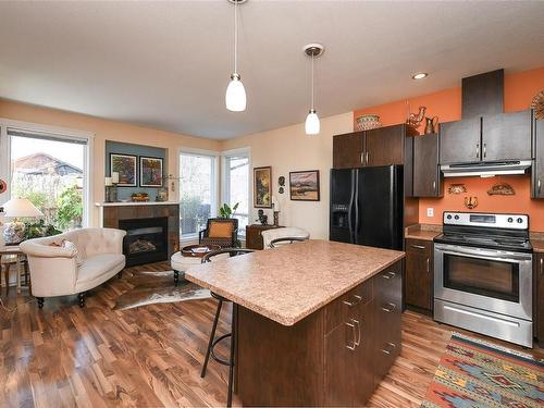 B-751 9Th St, Courtenay, BC - Indoor Photo Showing Kitchen With Fireplace