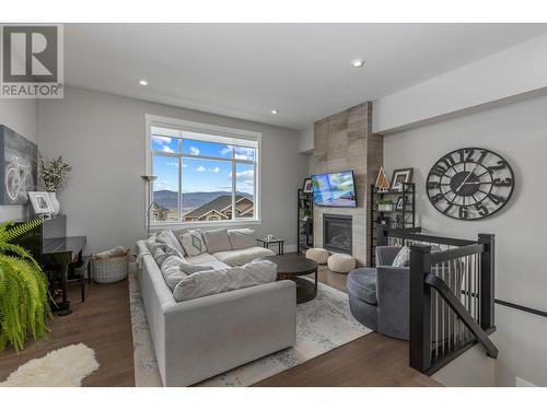 405 Prestwick Street, Kelowna, BC - Indoor Photo Showing Living Room With Fireplace