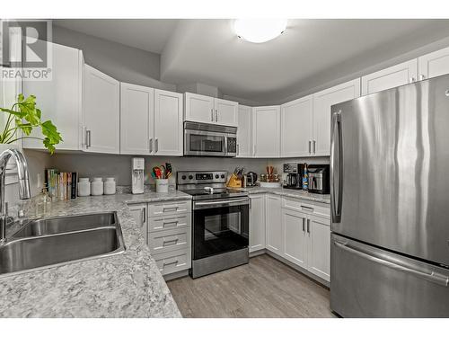 405 Prestwick Street, Kelowna, BC - Indoor Photo Showing Kitchen With Double Sink