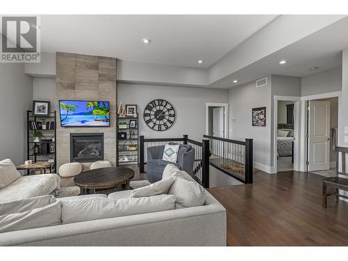 405 Prestwick Street, Kelowna, BC - Indoor Photo Showing Living Room With Fireplace