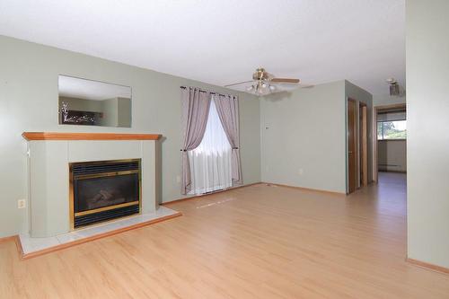 13 Cumming Street, St. Catharines, ON - Indoor Photo Showing Living Room With Fireplace