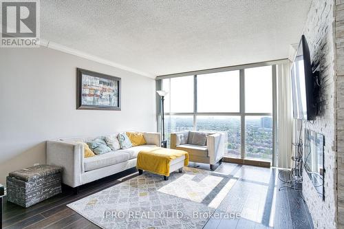 2111 - 35 Trailwood Drive E, Mississauga, ON - Indoor Photo Showing Living Room