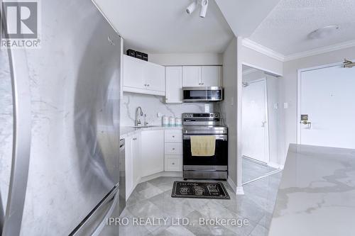 2111 - 35 Trailwood Drive E, Mississauga, ON - Indoor Photo Showing Kitchen
