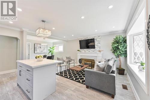 2544 St Clair Avenue E, Toronto, ON - Indoor Photo Showing Living Room With Fireplace