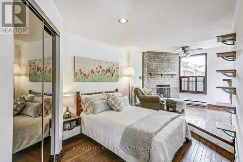 111 Maclean Avenue, Toronto, ON - Indoor Photo Showing Bedroom With Fireplace