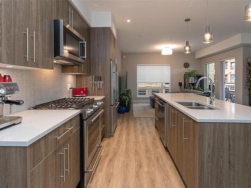 304-2500 Hackett Cres, Central Saanich, BC - Indoor Photo Showing Kitchen With Double Sink With Upgraded Kitchen