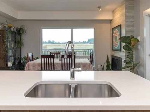 304-2500 Hackett Cres, Central Saanich, BC - Indoor Photo Showing Kitchen With Double Sink