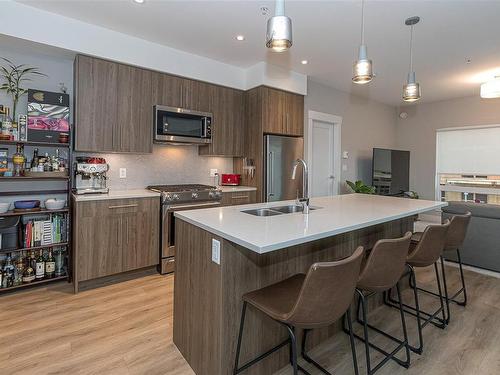 304-2500 Hackett Cres, Central Saanich, BC - Indoor Photo Showing Kitchen With Double Sink With Upgraded Kitchen