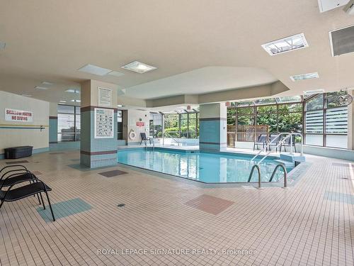 701-712 Rossland Rd E, Whitby, ON - Indoor Photo Showing Other Room With In Ground Pool